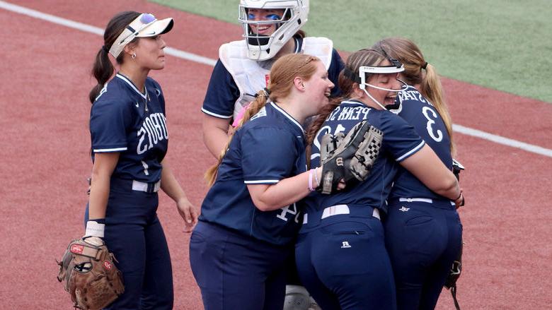 Members of the Penn State DuBois softball team celebrate an extra innings win over Lyon College during the 2024 USCAA Small College World Series.